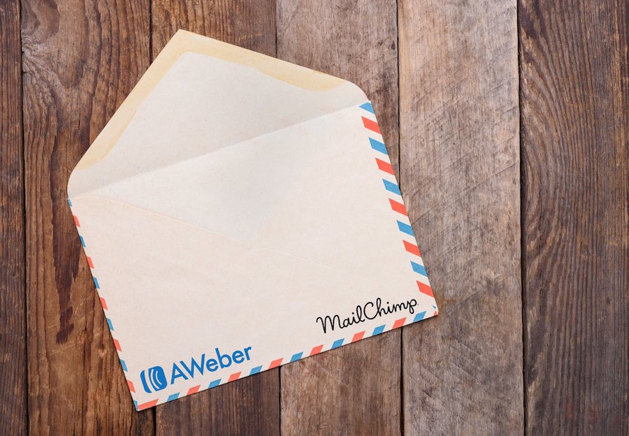 Mailchimp vs Aweber comparison (image of an envelope showing both products' logos).