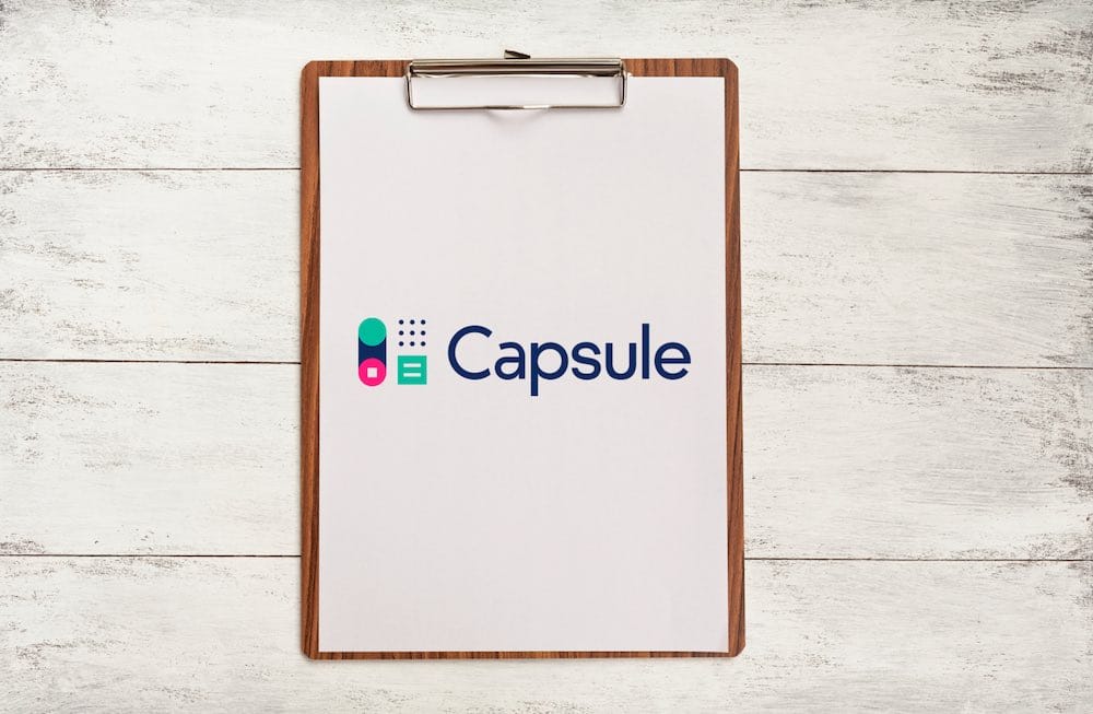 Capsule CRM review (image of the product logo on a clipboard)