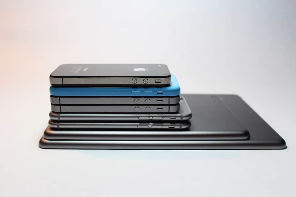 Digital declutter - image of a pile of phones on top of each other.