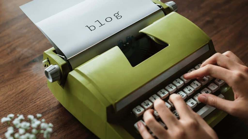 Increase blog traffic — image of a blogger typing