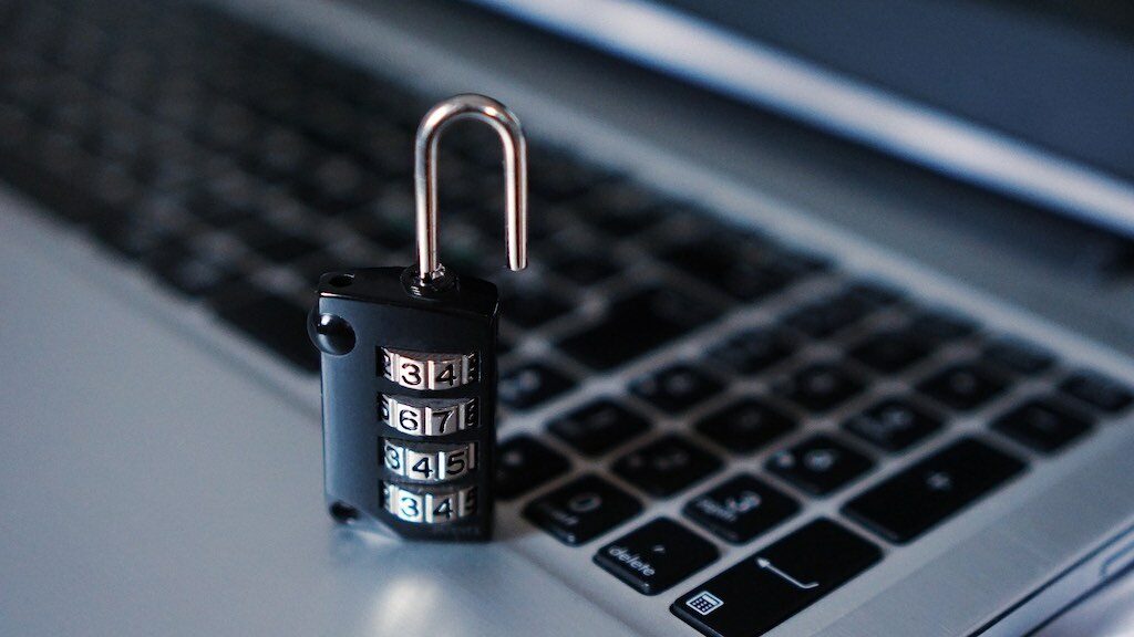 Cyber security tips — image of a computer and a padlock
