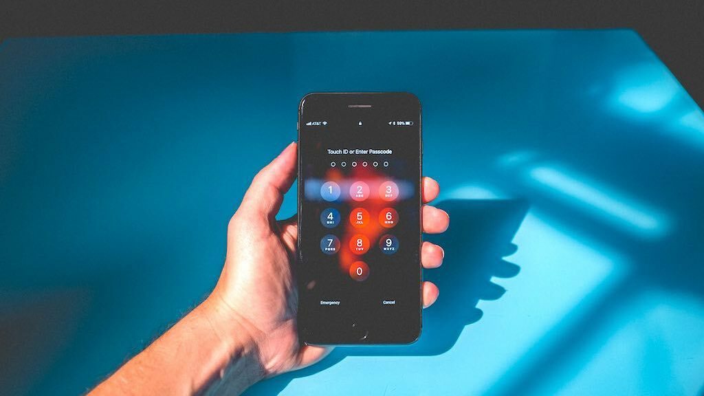 Password protection on a smartphone — creating strong, unique passwords is one of our key cyber security tips.