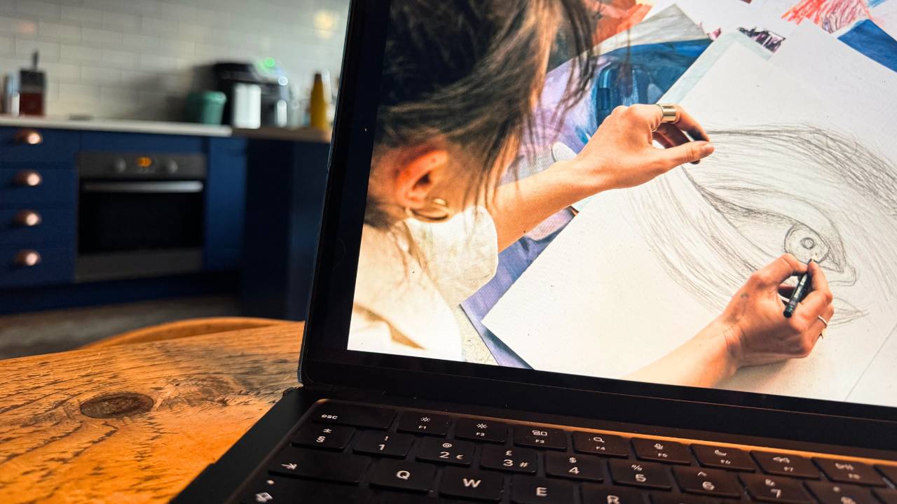 How to sell art online (image of some art on a laptop)
