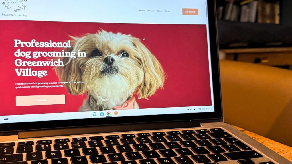 A laptop displaying a professional small business website for a dog grooming company, created with Squarespace.